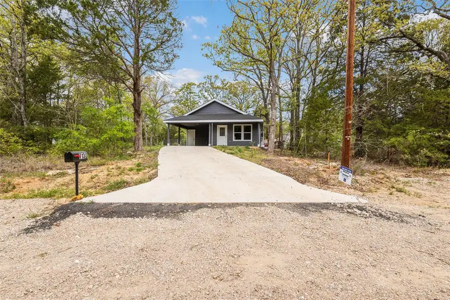Front exterior of a new home in , Mabank, TX, highlighting curb appeal (Image 1). Front exterior of a new home in , Mabank, TX, highlighting curb appeal (Image 1).