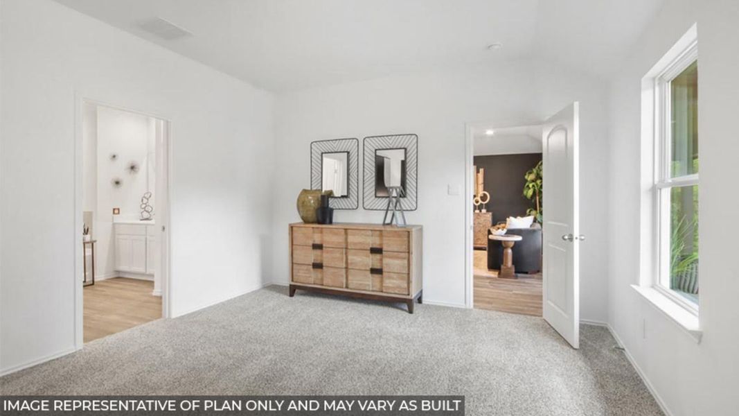 Furnished interior view inside a new home in Sunterra, Katy (Image 9).