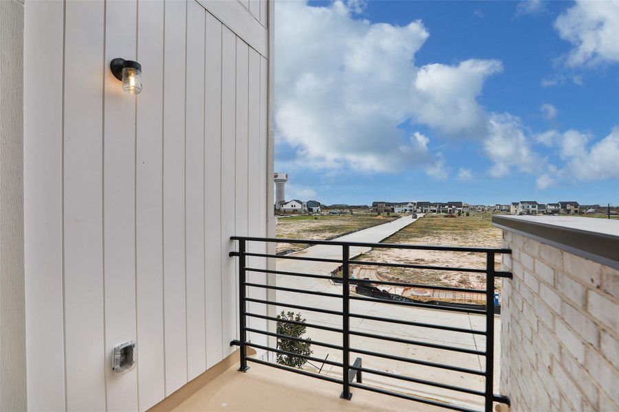 Exterior details and patio area of a home in Bridgeland Central, Cypress (Image 21).