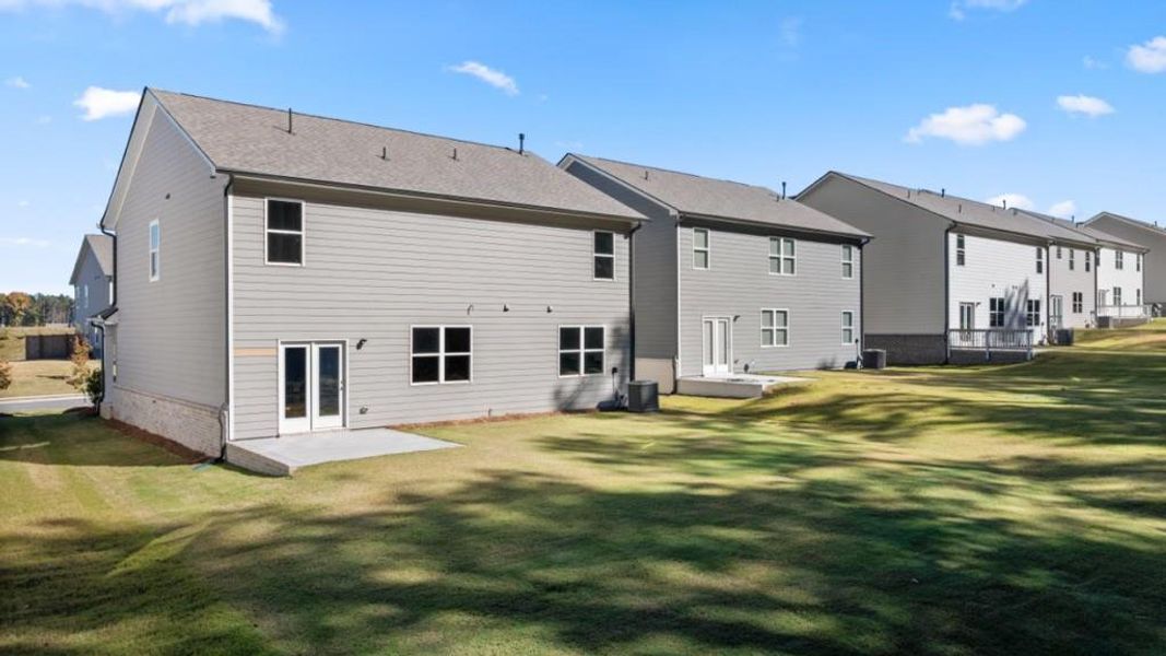 Exterior details and patio area of a home in Hamptons at Riverwood South, Dallas (Image 2).