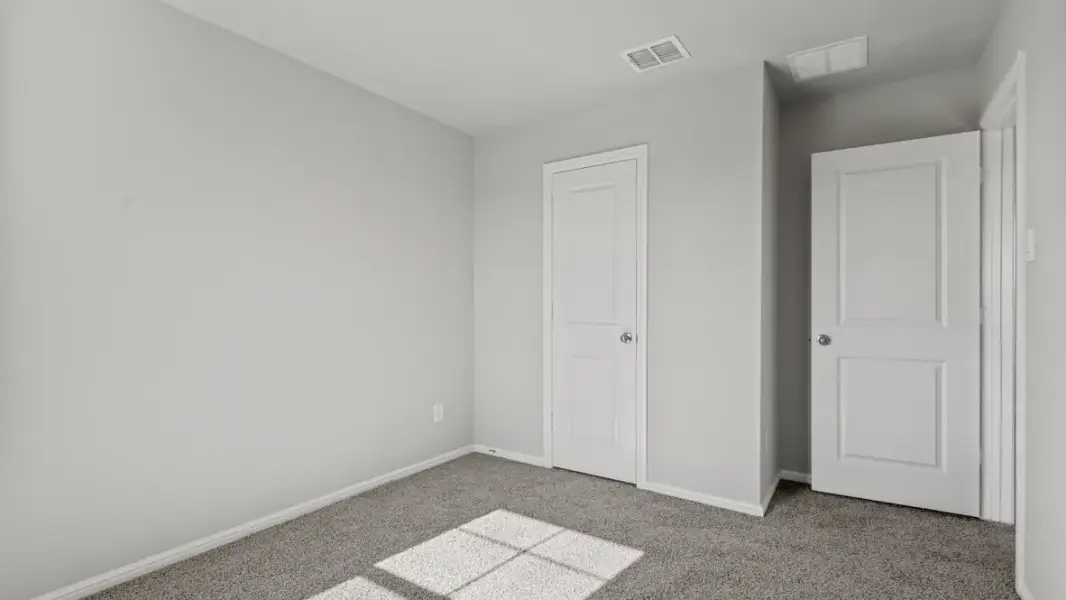 Representative unfurnished interior of a home built from the Midland by D.R. Horton in Audra Oaks, Denton (Image 41).