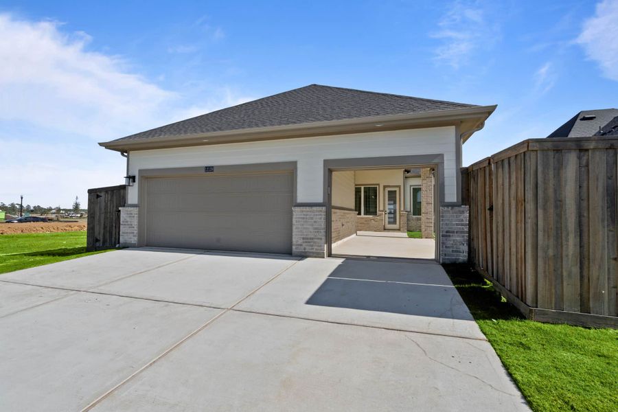 Front exterior of a new home in Riceland, Mont Belvieu, TX, highlighting curb appeal (Image 20). Front exterior of a new home in Riceland, Mont Belvieu, TX, highlighting curb appeal (Image 20).