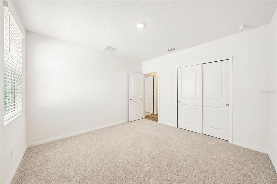 Spacious, unfurnished interior of a new home in Pine Ridge Meadows, Hudson (Image 52).