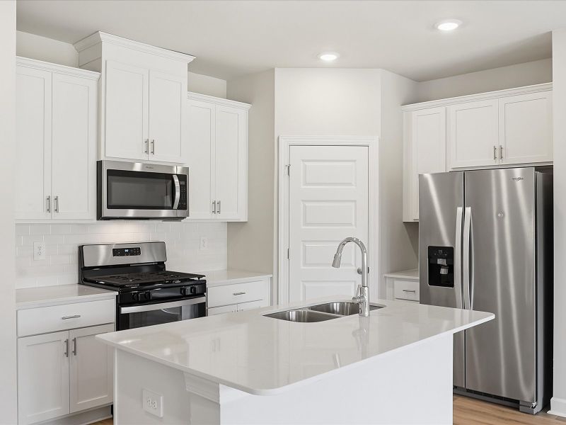 Furnished interior view inside a new home in Crossing at Abner Creek Townes, Greer (Image 5).