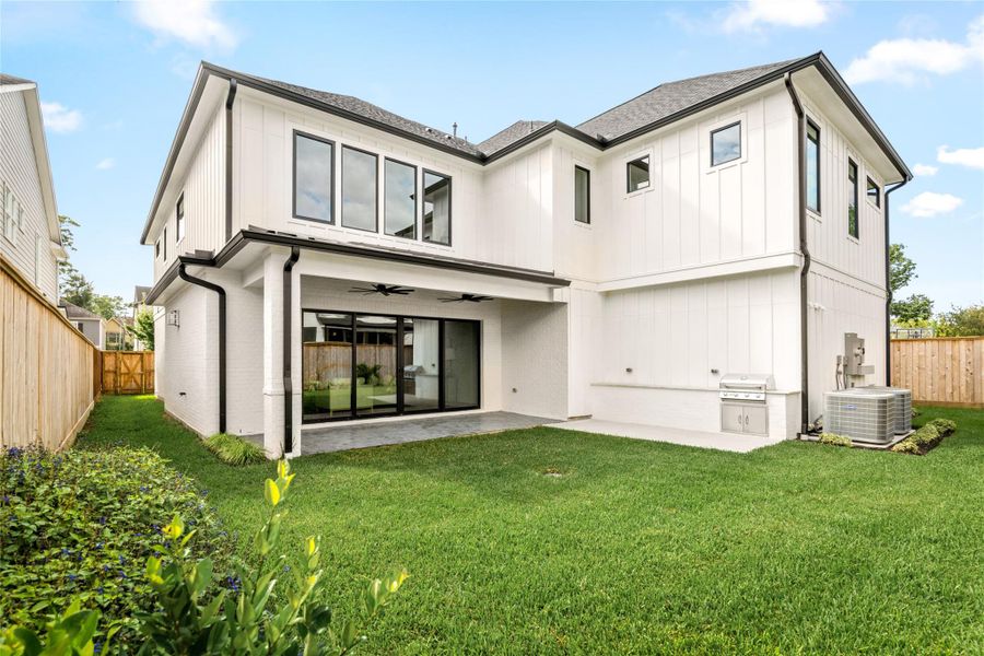 Exterior details and patio area of a home in , Houston (Image 2). Exterior details and patio area of a home in , Houston (Image 2).