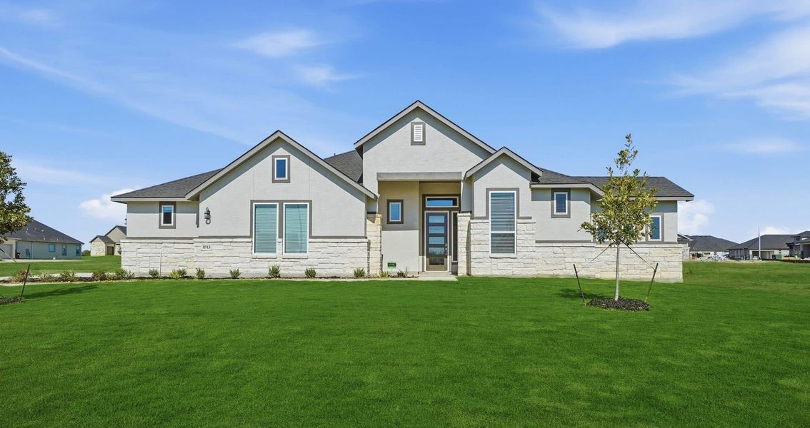 Representative exterior photo of a completed home built from the Brandon by Chesmar Homes in Sienna Lakes, San Antonio, TX (Image 15).
