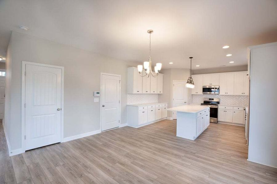Representative unfurnished interior of a home built from the Drayton by Caviness & Cates Communities in Bartlett Manor, Youngsville (Image 81).
