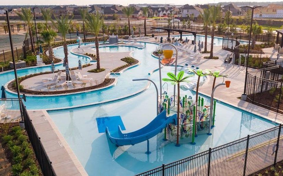 Residents enjoy access to resort-style amenities, including a community pool, splash pad, playgrounds, walking trails, and recreational areas. Residents enjoy access to resort-style amenities, including a community pool, splash pad, playgrounds, walking trails, and recreational areas.