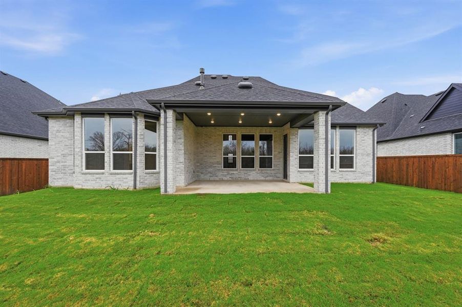 Exterior details and patio area of a home in Sonoma Verde: 70ft. lots, McLendon-Chisholm (Image 17).
