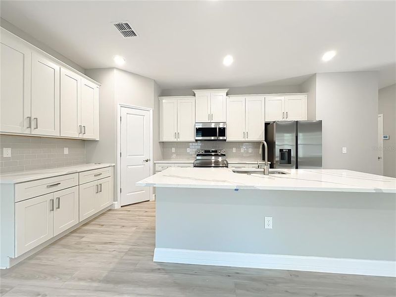 Furnished interior view inside a new home in , Ocala (Image 7).