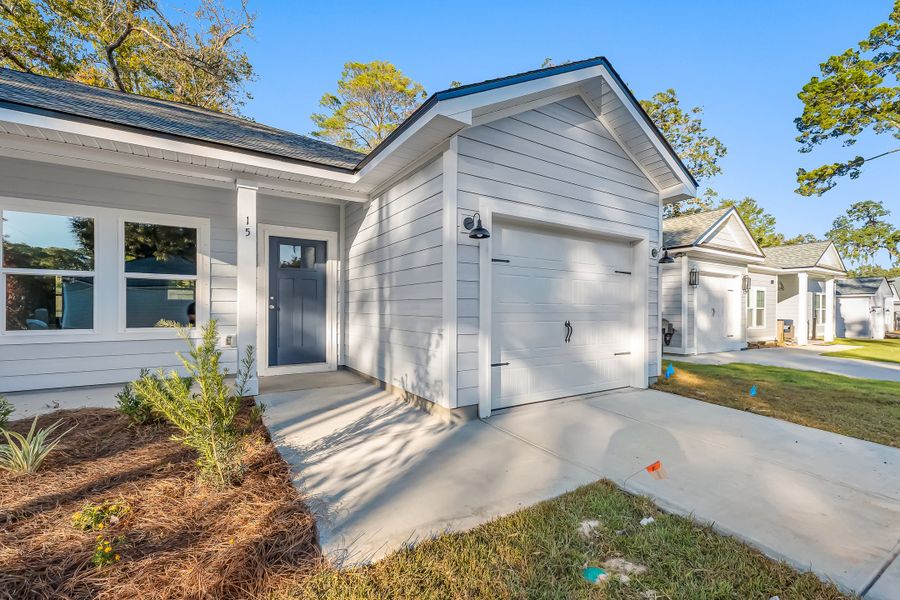 Exterior details and patio area of a home in Live Oak Cottages, Freeport (Image 3). Exterior details and patio area of a home in Live Oak Cottages, Freeport (Image 3).