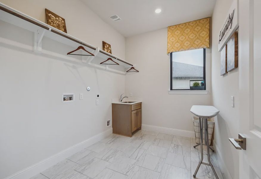 Plan 6020 laundry room - staged - 13 of 23 Plan 6020 laundry room - staged - 13 of 23