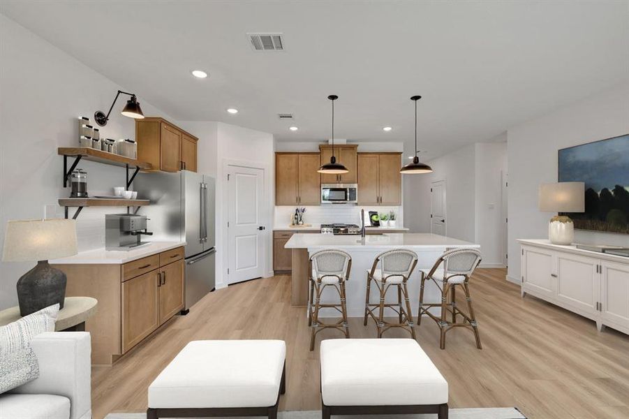 Furnished interior view inside a new home in Aspire at Noble Ridge, Howe (Image 12).
