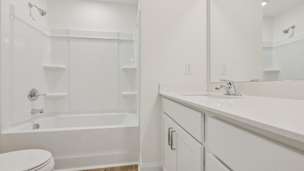 Representative furnished interior of a home built from the Rochester by DRB Homes in Battle Bridge, Raleigh (Image 16). Representative furnished interior of a home built from the Rochester by DRB Homes in Battle Bridge, Raleigh (Image 16).