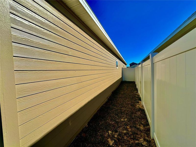 Exterior details and patio area of a home in Pioneer Ranch, Ocala (Image 33).