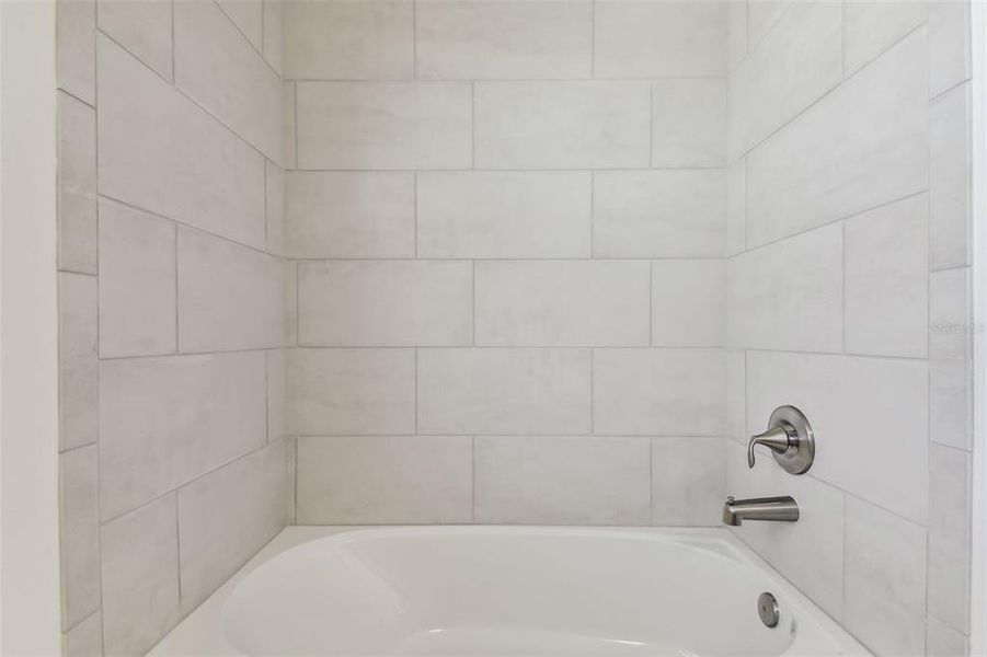 Photos are not the home listed, but same floor plan.