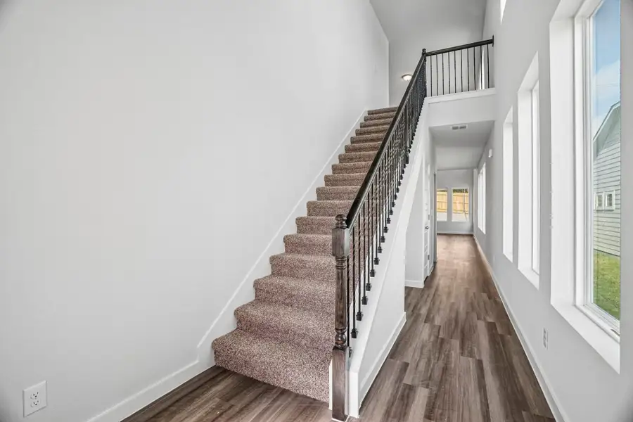 Spacious, unfurnished interior of a new home in The Meadows at Hunters Ranch, San Antonio (Image 26).