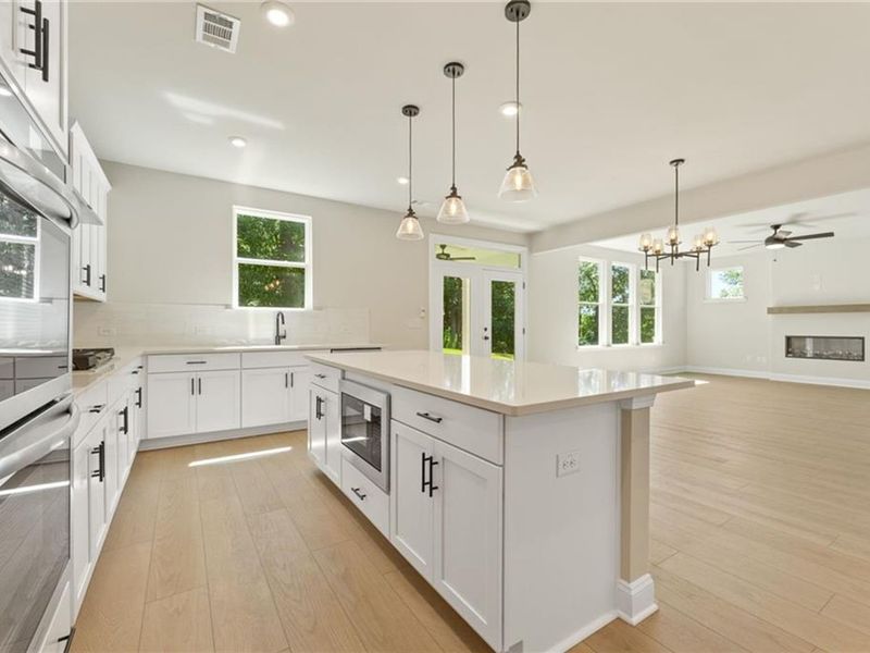 Furnished interior view inside a new home in Melody Lakeside Estates, Buford (Image 3).