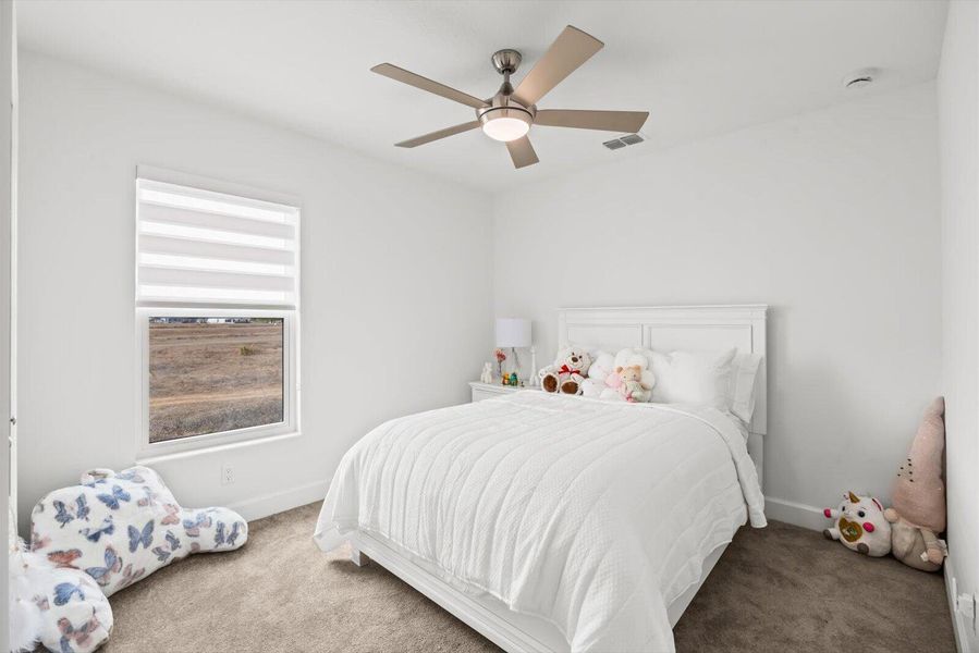 Spacious Guest Room with Elegant Finishes and Large Picture Window
