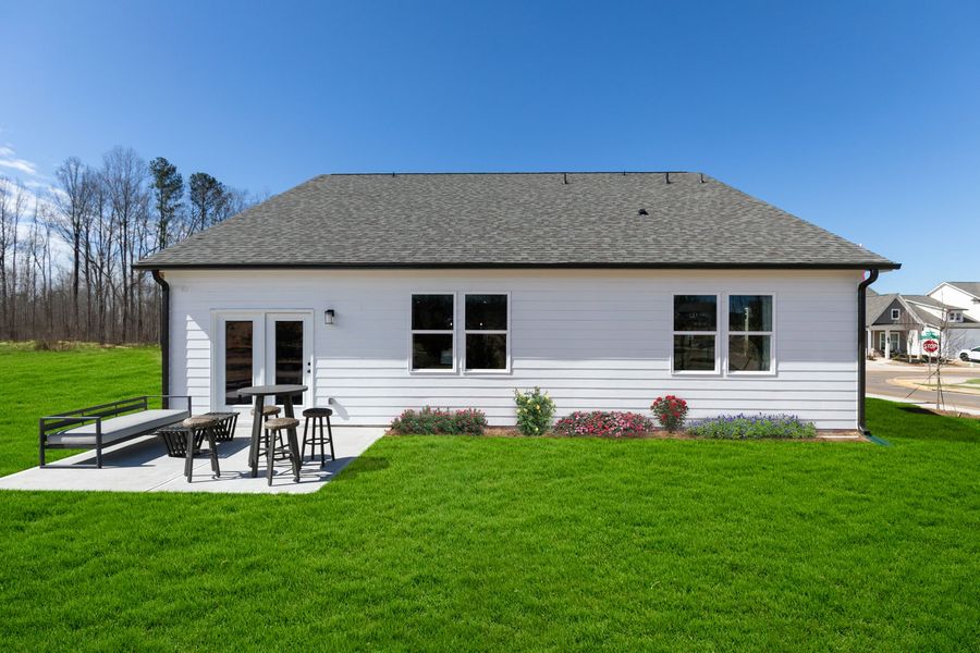 Exterior details and patio area of a home in The Beacon at Old Peachtree Single Family Homes, Lawrenceville (Image 73).