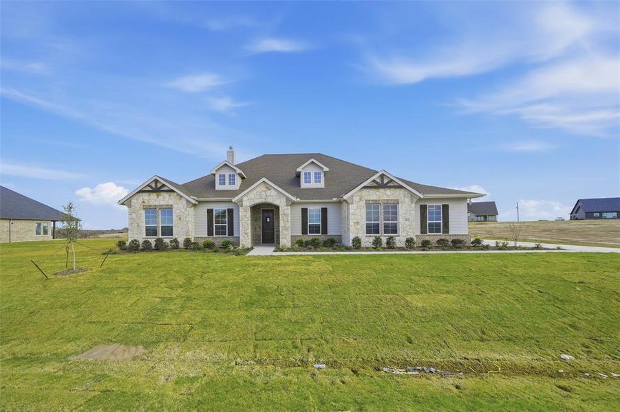 Front exterior of a new home in Eagle Ridge Estates, Weatherford, TX, highlighting curb appeal (Image 22).