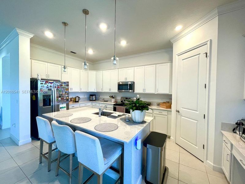 Furnished interior view inside a new home in , Port St. Lucie (Image 15).