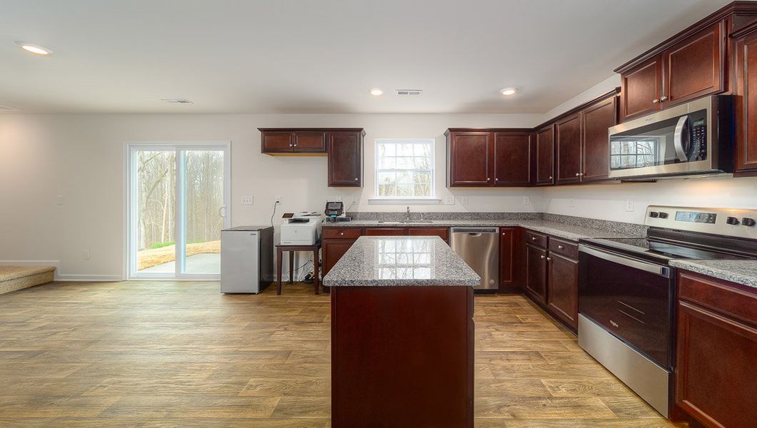 Representative furnished interior of a home built from the Harrison by D.R. Horton in Brookside Farms - The Meadows, Greer (Image 8).