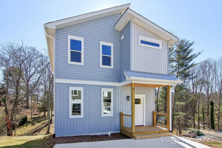 Front exterior of a new home in , Asheville, NC, highlighting curb appeal (Image 1).