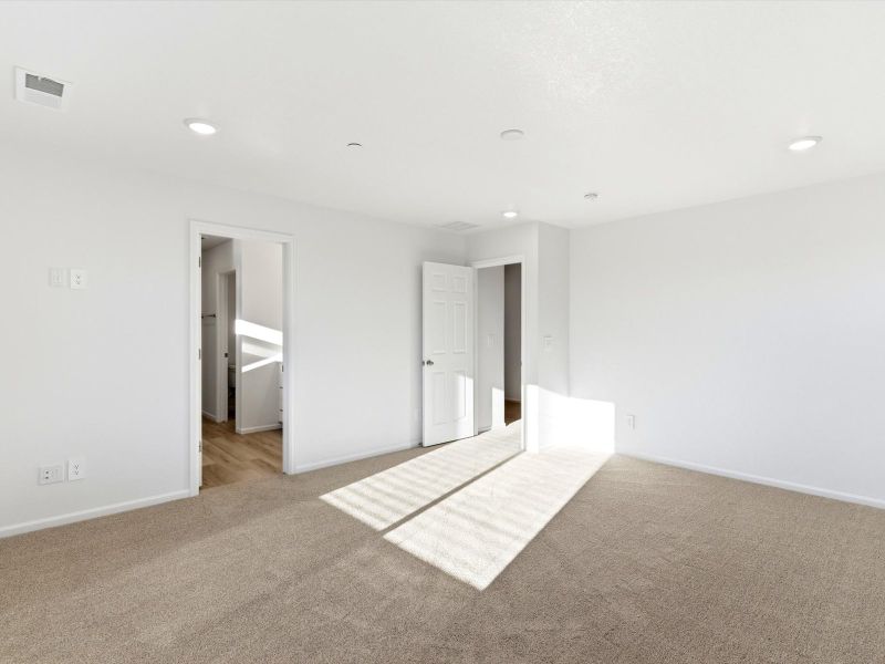 Spacious, unfurnished interior of a new home in Buffalo Highlands: The Flora Collection, Commerce City (Image 17).