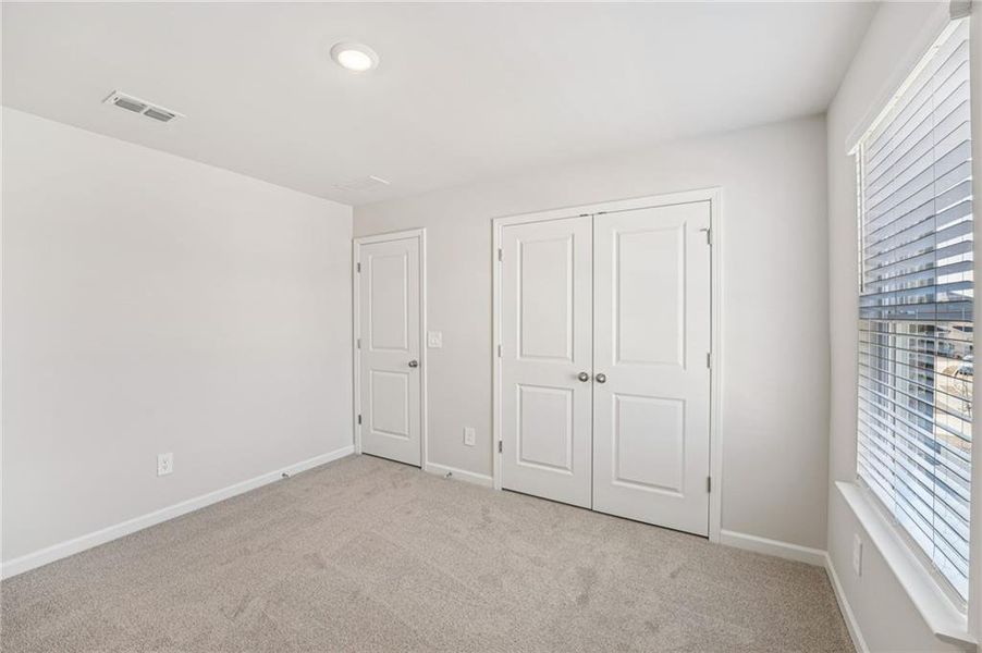 Spacious, unfurnished interior of a new home in Creekside at Oxford Park, Fairburn (Image 43).