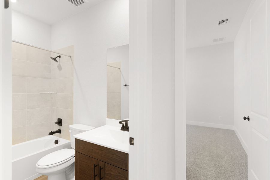 Furnished interior view inside a new home in The Grove at Blackhawk, Pflugerville (Image 16).