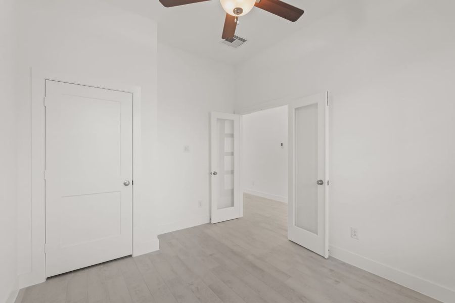 Representative unfurnished interior of a home built from the Fairway by Chesmar Homes in Riceland Alley Loads, Mont Belvieu (Image 11).