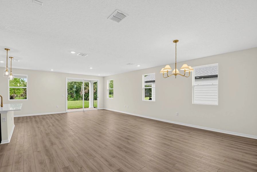 Spacious, unfurnished interior of a new home in Ardisia Park, New Smyrna Beach (Image 19).