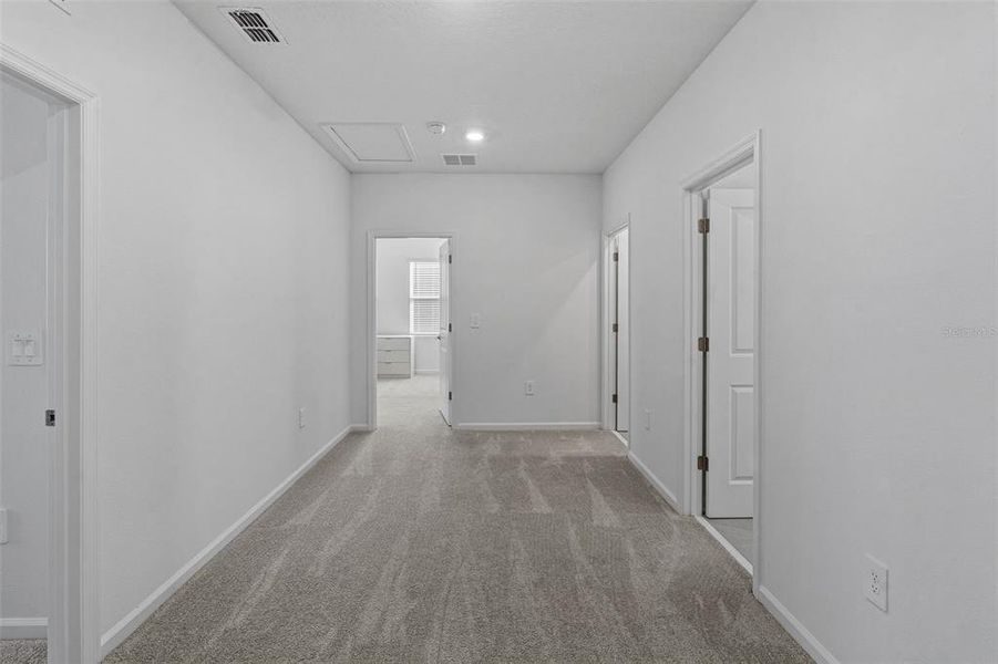 Spacious, unfurnished interior of a new home in Wellness Ridge, Clermont (Image 53).