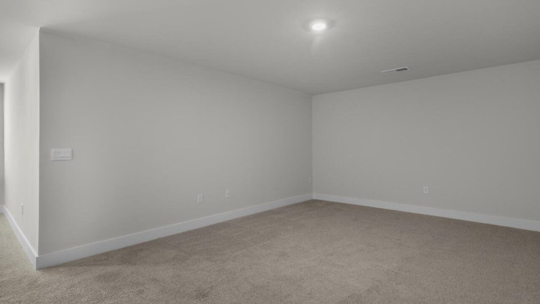 Spacious, unfurnished interior of a new home in Surfside Landing, Hubert (Image 29).