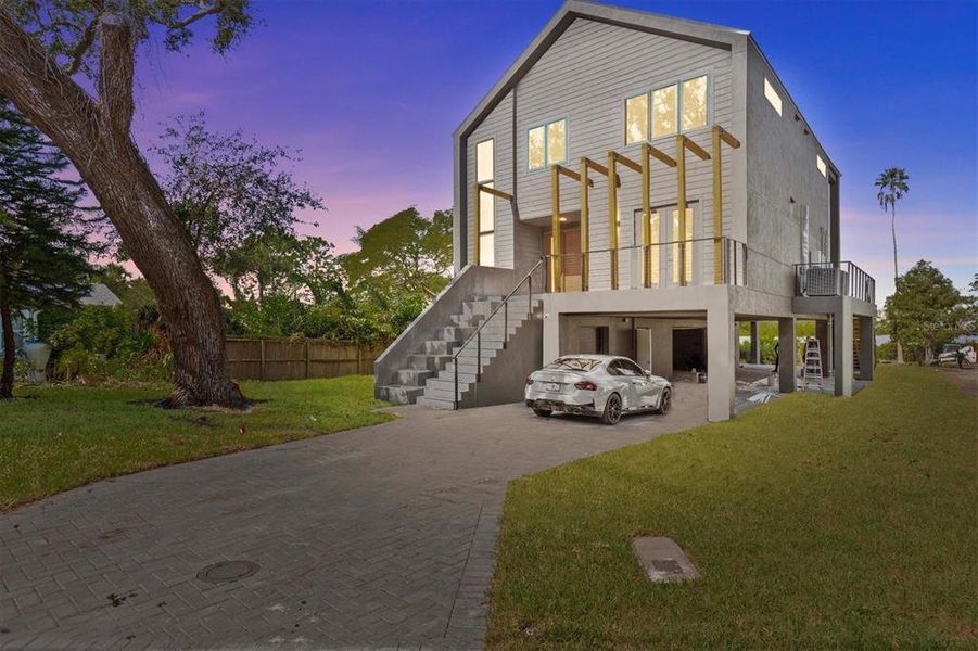 Front exterior of a new home in , Clearwater, FL, highlighting curb appeal (Image 25).