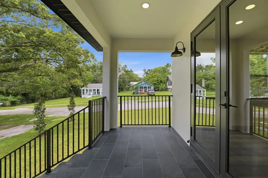 Exterior details and patio area of a home in , Brooksville (Image 3).