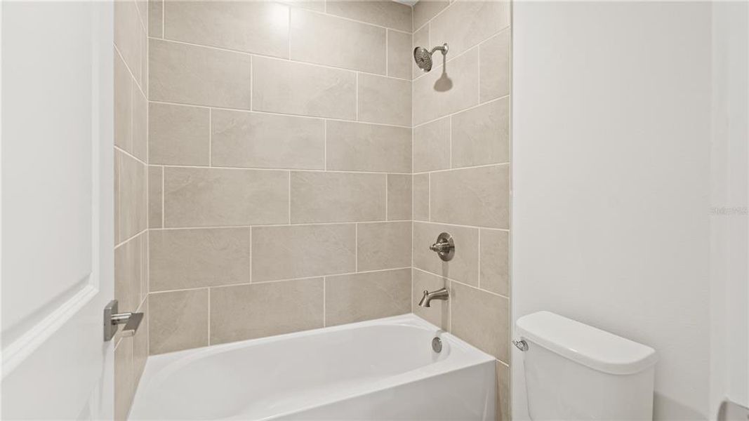 Furnished interior view inside a new home in Willowbrook North, Winter Haven (Image 5).