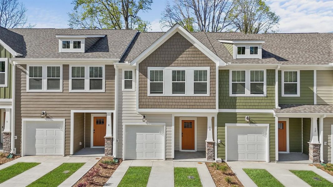 Front exterior of a new home in Clayton Crossing, Arden, NC, highlighting curb appeal (Image 1).