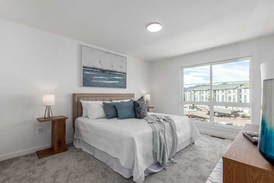 Furnished interior view inside a new home in The Commons at Victory Ridge, Colorado Springs (Image 14).