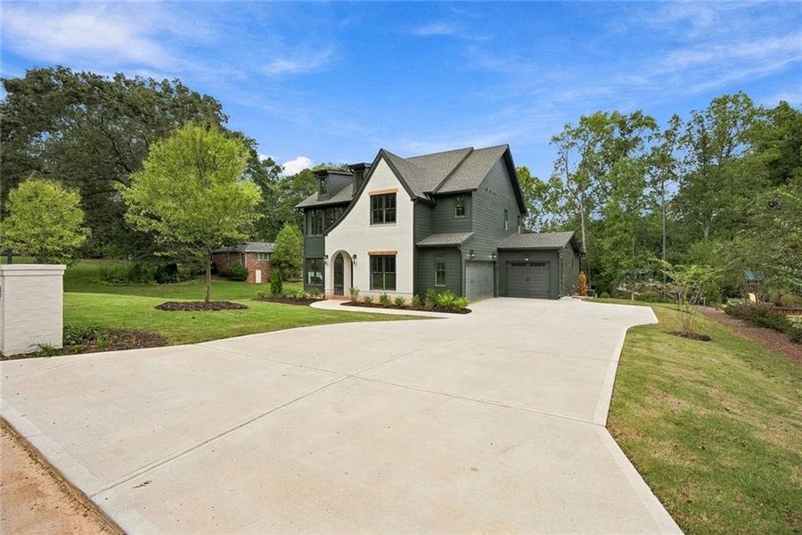 Front exterior of a new home in , Smyrna, GA, highlighting curb appeal (Image 32).