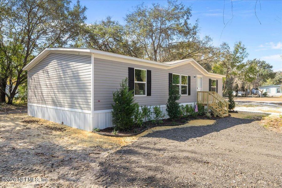 Exterior details and patio area of a home in , Interlachen (Image 14). Exterior details and patio area of a home in , Interlachen (Image 14).