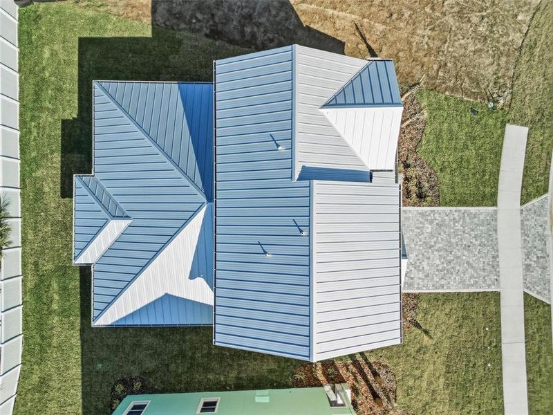 Exterior details and patio area of a home in Beachview Cove, Ormond Beach (Image 3).