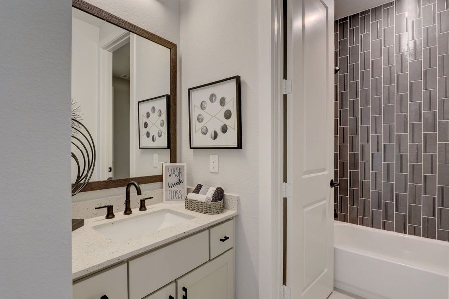 Representative furnished interior of a home built from the The Lindy by Westin Homes in Flora, Hutto (Image 11).