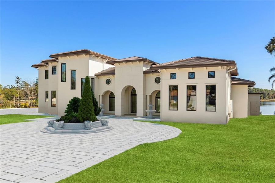 Front exterior of a new home in , Lake Mary, FL, highlighting curb appeal (Image 5).