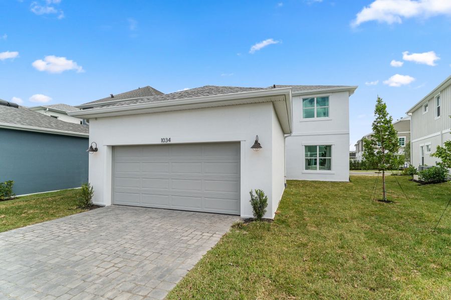 Representative exterior photo of a completed home built from the Dahlberg by Mattamy Homes in Newfield - Rosette Park, Palm City, FL (Image 17).