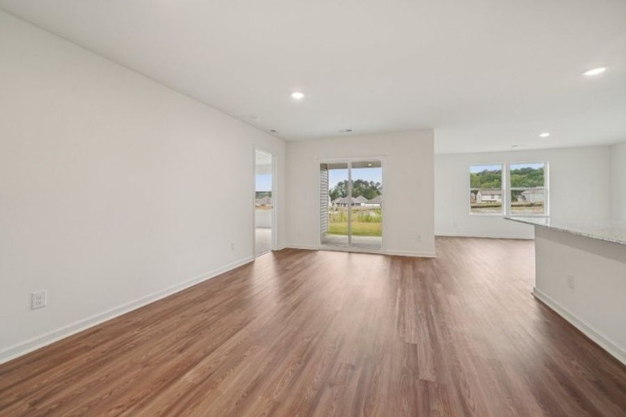 A room with a wood floor and a wood floor. A room with a wood floor and a wood floor.