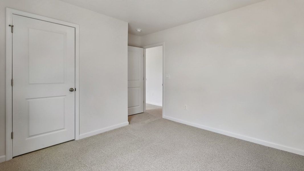 Spacious, unfurnished interior of a new home in Bexford, Willow Spring (Image 28).