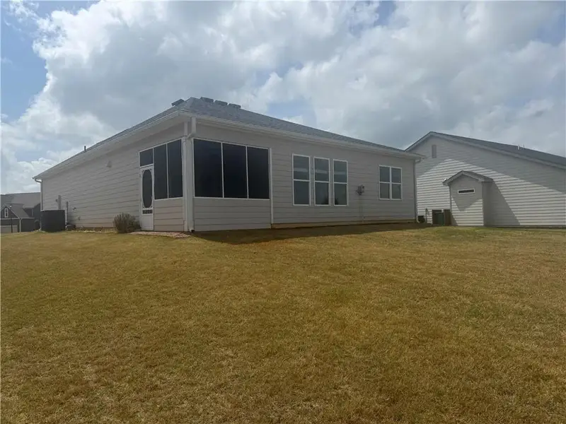 Exterior details and patio area of a home in , Homer (Image 3).