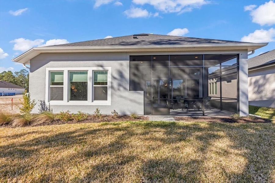 Exterior details and patio area of a home in Woodhaven, Port Orange (Image 33). Exterior details and patio area of a home in Woodhaven, Port Orange (Image 33).
